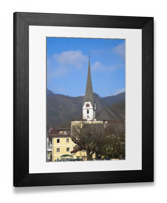 Framed Print : Bad Ischl, Upper Austria, Austria - View of an old world church. Mountains are viewable Framed Print : Bad Ischl, Upper Austria, Austria - View of an old world church. Mountains are viewable