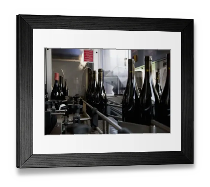 Framed Print : Gsing am Wagram, Lower Austria, Austria - Closeup of metal wine bottling mechanism Framed Print : Gsing am Wagram, Lower Austria, Austria - Closeup of metal wine bottling mechanism