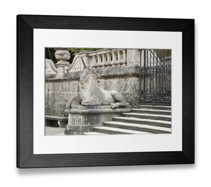 Framed Print : Salzburg, Salzburg, Austria - Closeup of a stone unicorn. It is resting on a pillar