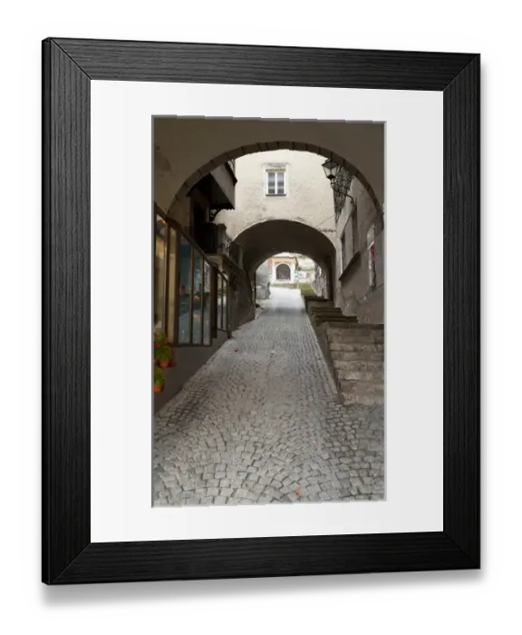 Framed Print : Salzburg, Salzburg, Austria - Low angle view from the bottom of an arched walkway Framed Print : Salzburg, Salzburg, Austria - Low angle view from the bottom of an arched walkway