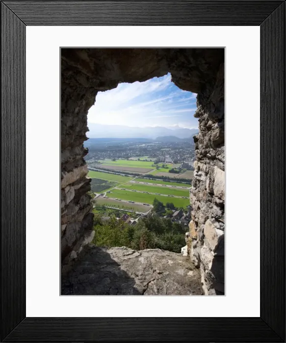 Framed Print : Villach, Carinthia, Austria - A rural landscape as seen from the remnants of an old stone window Framed Print : Villach, Carinthia, Austria - A rural landscape as seen from the remnants of an old stone window