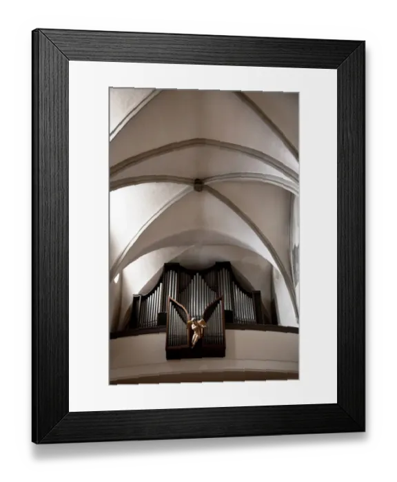 Framed Print : Wels, Upper Austria, Austria - A statue of an angel is in front of a pipe organ s Framed Print : Wels, Upper Austria, Austria - A statue of an angel is in front of a pipe organ s