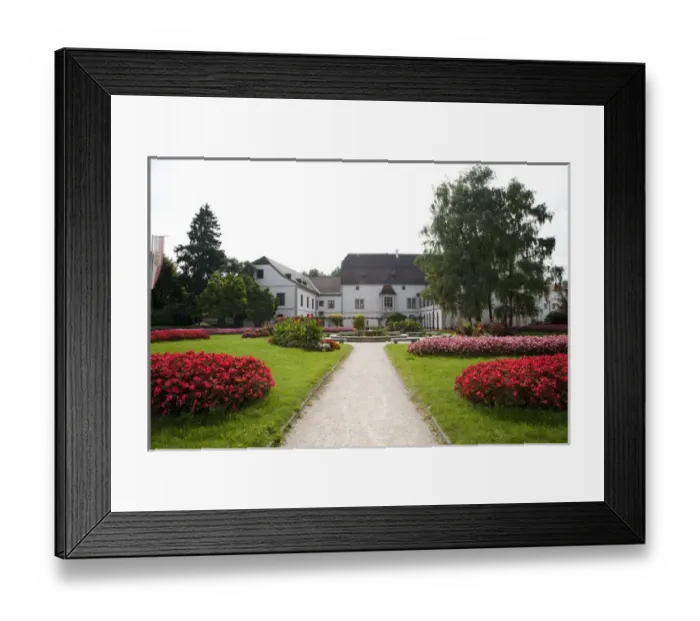Framed Print : Wels, Upper Austria, Austria - A pathway is leading through a garden with grass Framed Print : Wels, Upper Austria, Austria - A pathway is leading through a garden with grass