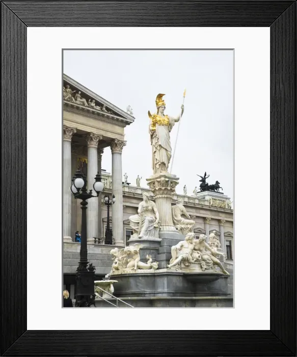 Framed Print : Vienna, Austria - A romanesque statue stands on a dry water feature in front of a Framed Print : Vienna, Austria - A romanesque statue stands on a dry water feature in front of a
