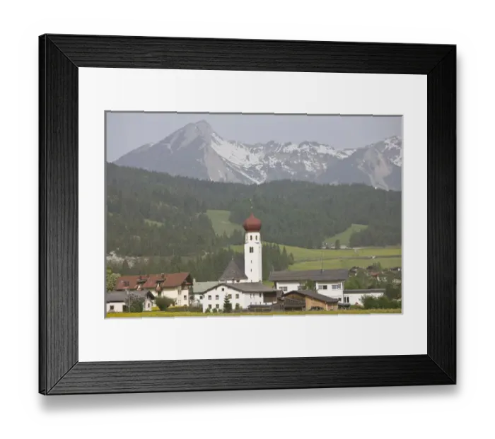 Framed Print : AUSTRIA, Lechtaler Alps, Heiterwang. Village view with Austrian Alps, springtime