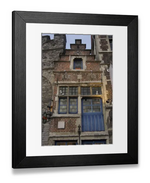 Framed Print : Europe, Belgium, Ghent. A narrow brick structure squeezed among Ghents historic Framed Print : Europe, Belgium, Ghent. A narrow brick structure squeezed among Ghents historic