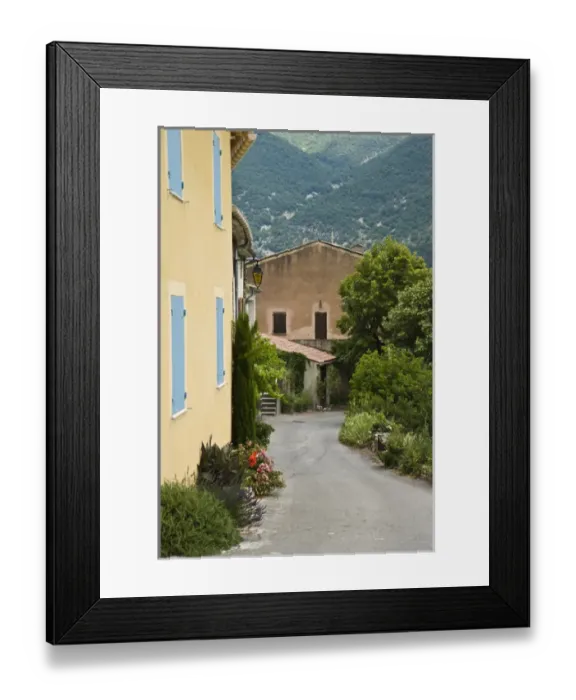 Framed Print : France, Provence. Road passing by houses Framed Print : France, Provence. Road passing by houses