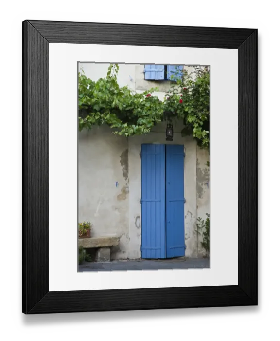 Framed Print : France, Provence, Lourmarin. Blue shutters cover a doorway to a home Framed Print : France, Provence, Lourmarin. Blue shutters cover a doorway to a home