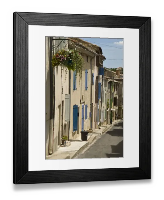 Framed Print : France, Provence, Valensole. A sunny street scene in town Framed Print : France, Provence, Valensole. A sunny street scene in town