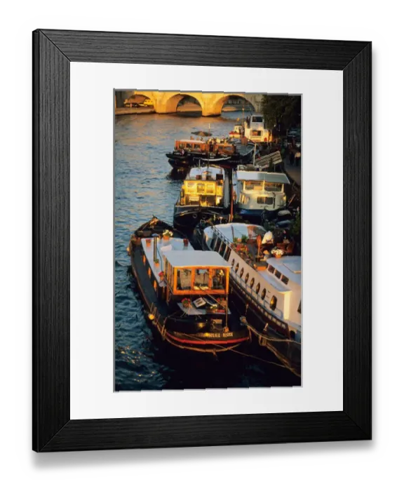 Framed Print : Barges tied up to quai along Seine; Pont Neuf Paris; France Framed Print : Barges tied up to quai along Seine; Pont Neuf Paris; France