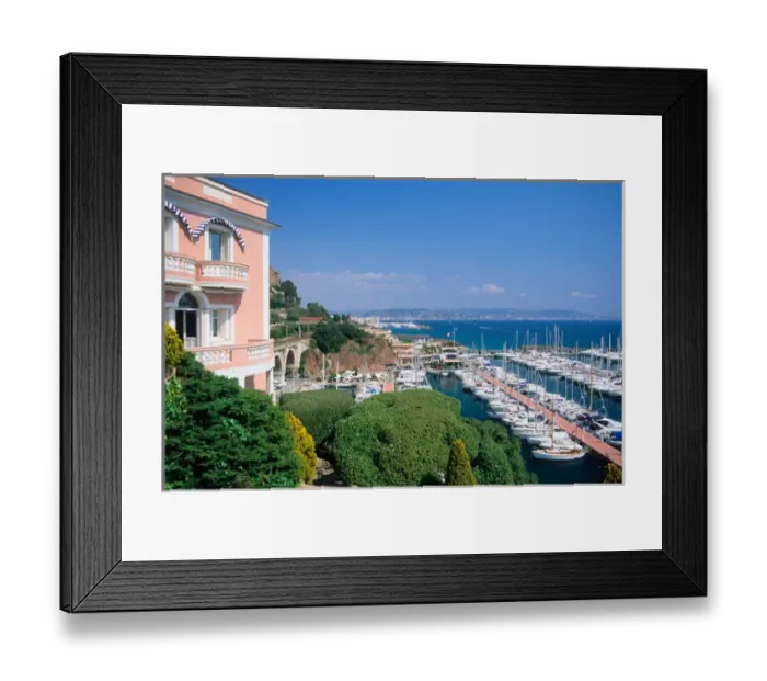 Framed Print : Villa overlooking a marina on the French Riviera west of Nice, France