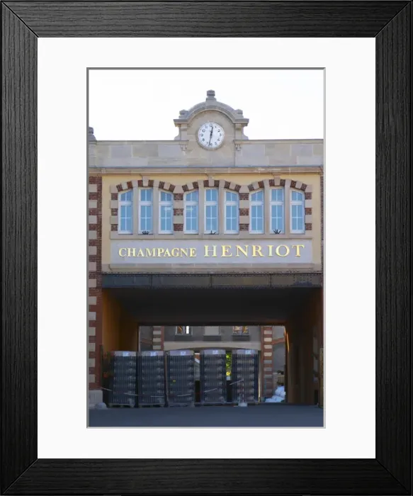 Framed Print : The entrance to the winery at Champagne Henriot with empty champagne bottles, Reims