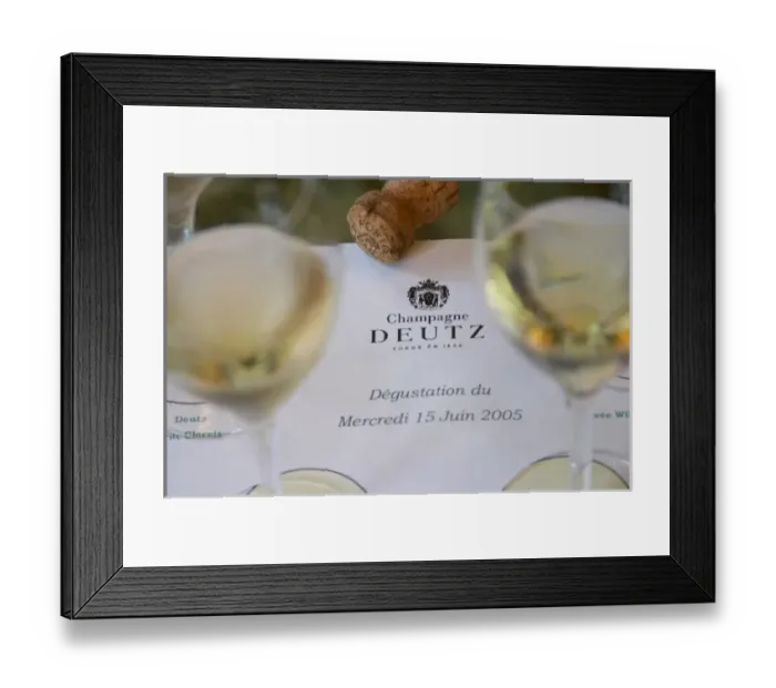 Framed Print : Glasses of champagne set on a white background for a tasting of the range of wines