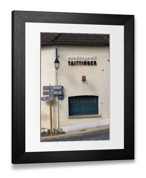Framed Print : A street with street signs to Fismes, nanteuil and Cumieres and a building that is