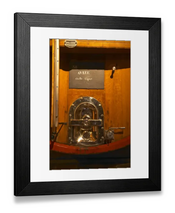 Framed Print : In the wine cellar: la detail of a large oak storage casks with a polished hatch