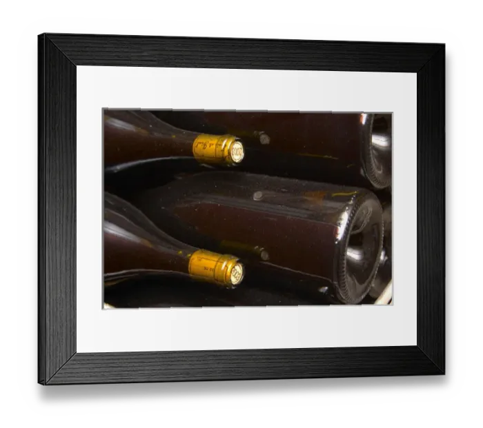 Framed Print : Bottles lying down with corks stamped with the vintage 2003. Domaine Eric et Joel Joel Durand Framed Print : Bottles lying down with corks stamped with the vintage 2003. Domaine Eric et Joel Joel Durand