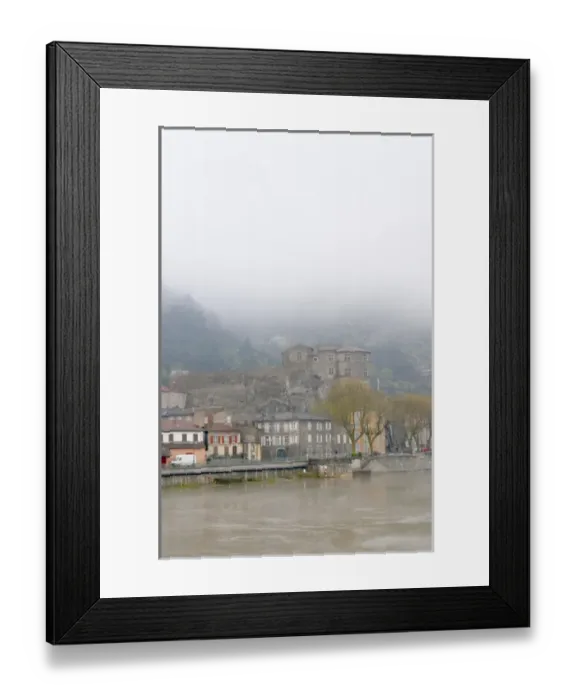 Framed Print : The town Tournon across the Rhone river with the Chateau de Tournon. under snow Framed Print : The town Tournon across the Rhone river with the Chateau de Tournon. under snow