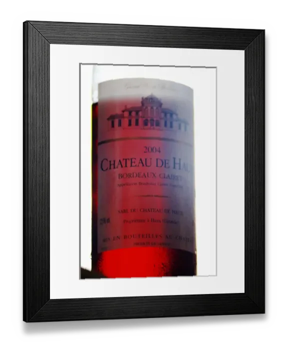 Framed Print : A bottle of Chateau de Haux rose clairet wine backlit Chateau de Haux Premieres