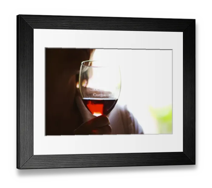 Framed Print : Woman with a glass of rose clairet wine with Chateau de Haux emblazoned on the glass Framed Print : Woman with a glass of rose clairet wine with Chateau de Haux emblazoned on the glass