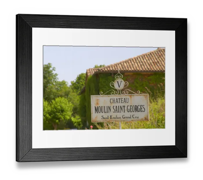 Framed Print : A white sign saying Chateau Moulin Saint Georges Saint Emilion Grand Cru Saint Emilion