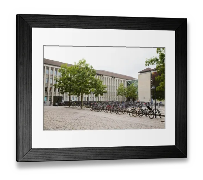 Framed Print : Copenhagen, Denmark - A cobblestone street in an Old World city where bicycles are lined up Framed Print : Copenhagen, Denmark - A cobblestone street in an Old World city where bicycles are lined up