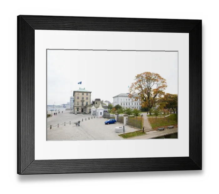 Framed Print : Copenhagen, Denmark - Cobblestone square in front of an old world building next to a city park Framed Print : Copenhagen, Denmark - Cobblestone square in front of an old world building next to a city park