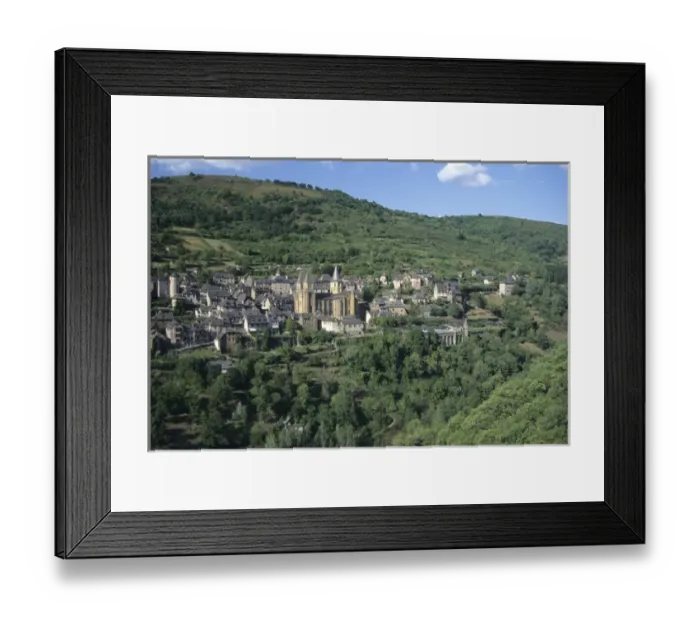 Framed Print : France: Conques, scenic view of Benedictine Abbey Church of Sainte-Foy and town nestled Framed Print : France: Conques, scenic view of Benedictine Abbey Church of Sainte-Foy and town nestled