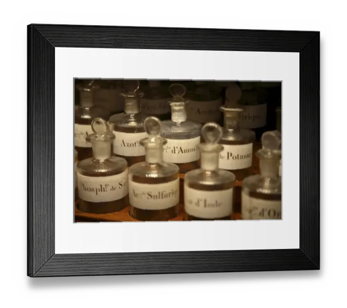 Framed Print : Old perfume testing bottles display in Musee du Parfum. Paris. France Framed Print : Old perfume testing bottles display in Musee du Parfum. Paris. France