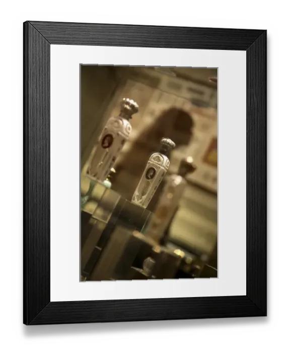 Framed Print : Old perfume bottles display in Musee du Parfum. Paris. France Framed Print : Old perfume bottles display in Musee du Parfum. Paris. France