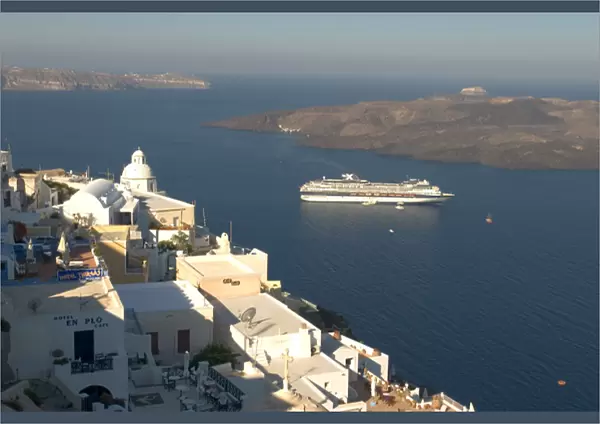 Europe, Greece, Dodecanese, Santorini: dawn breaking over anchored cruise ship