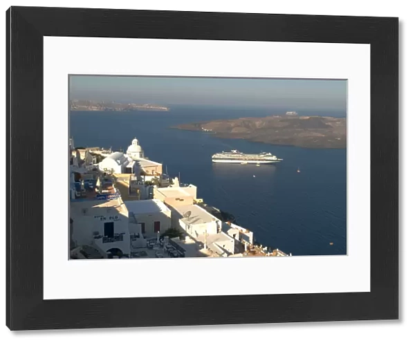 Europe, Greece, Dodecanese, Santorini: dawn breaking over anchored cruise ship