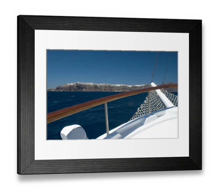 Framed Print : Europe, Greece, Dodecanese, Santorini: view of Oia on the cliff edges from a cruise