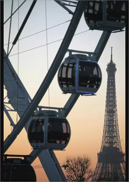 France. Paris. Ferry wheel in Place de la concorde with Eiffel Tower in the background