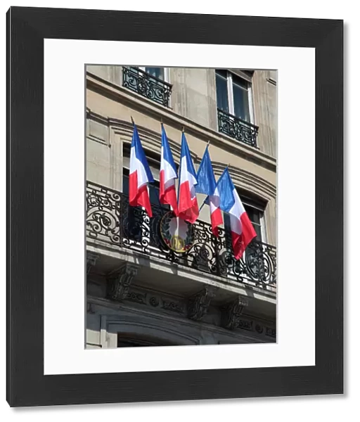 France. Paris. French national flags on a buiding
