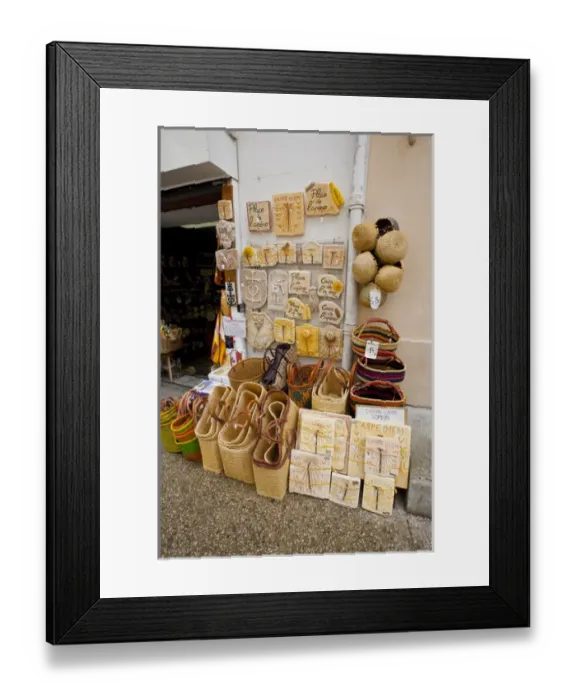 Framed Print : France, Provence, St. Remy-de-Provence. Wares on display outside souvenir shop. Credit as Framed Print : France, Provence, St. Remy-de-Provence. Wares on display outside souvenir shop. Credit as