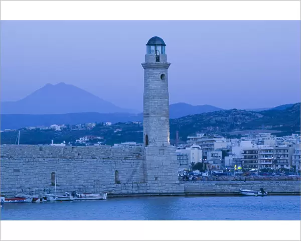 GREECE-CRETE-Rethymno Province-Rethymno: Venetian Harbor with lighthouse  /  Dusk
