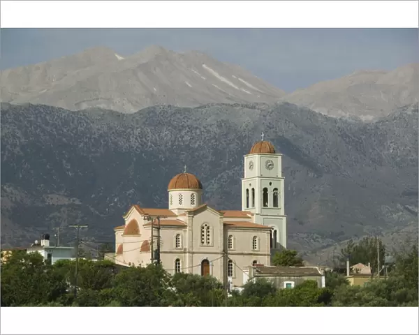 GREECE-CRETE-Hania Province-Kalamitsi Amigdalou: Town Church with Lefka Ori Mountains