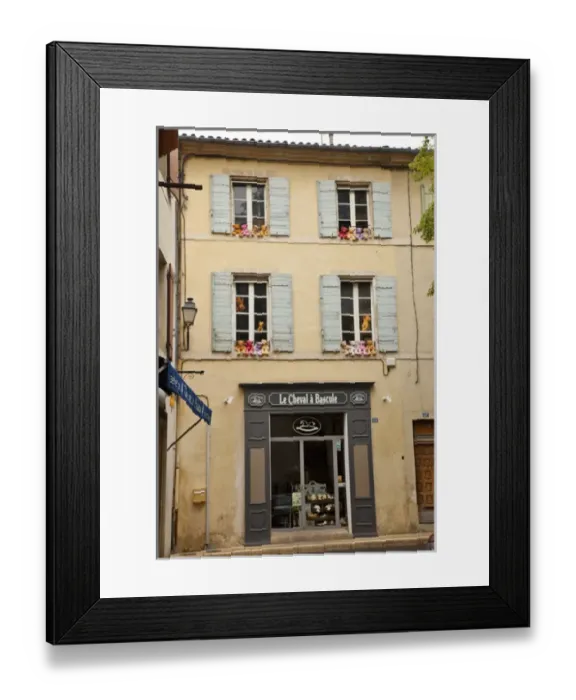 Framed Print : France, Provence, St. Remy-de-Provence. Colorful teddy bears on outside ledges of shop windows