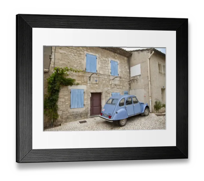 Framed Print : France, Provence, St. Remy-de-Provence. Classic Citroen car sits outside building Framed Print : France, Provence, St. Remy-de-Provence. Classic Citroen car sits outside building