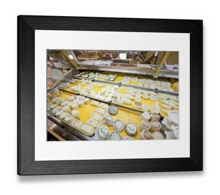 Framed Print : France, Provence, Cannes. Cheeses on display for sale at market. Credit as: Fred