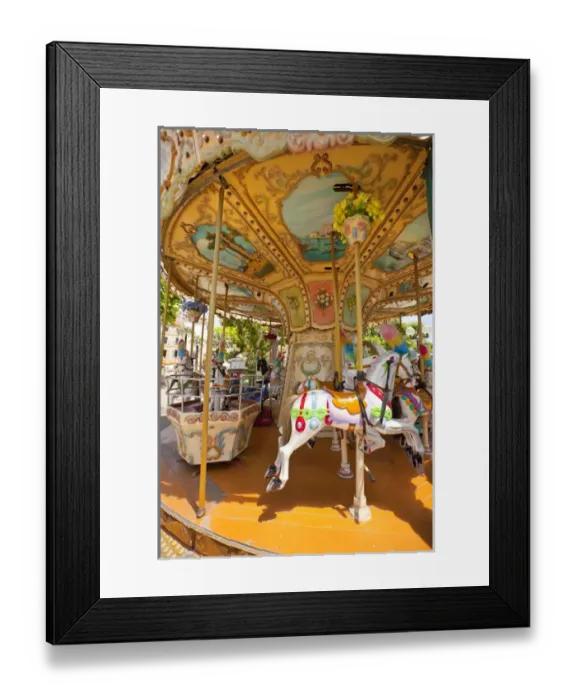 Framed Print : France, Provence, Cannes. Colorful and ornate outdoor carousel. Credit as: Fred Lord Framed Print : France, Provence, Cannes. Colorful and ornate outdoor carousel. Credit as: Fred Lord