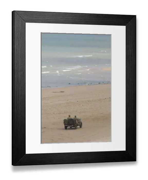 Framed Print : France, Normandy, Saint-Laurent-Sur-Mer, Omaha Beach. Vintage jeep, with soldiers in uniform