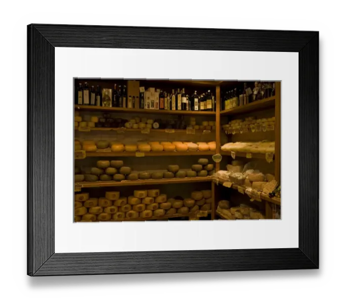 Framed Print : Italy, Tuscany, Pienza. Aged cheese wheels for sale in a shop Framed Print : Italy, Tuscany, Pienza. Aged cheese wheels for sale in a shop