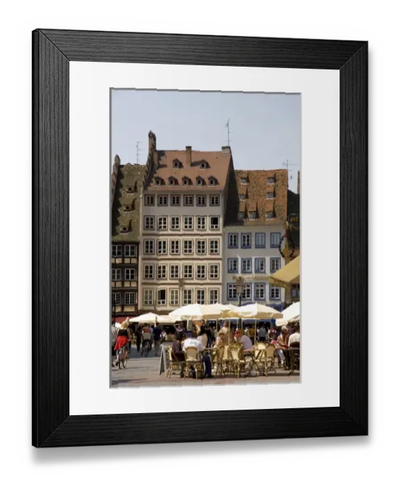 Framed Print : People gather in Cathedral Plaza and outdoor cafe at Strasbourg, France Framed Print : People gather in Cathedral Plaza and outdoor cafe at Strasbourg, France