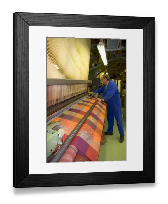 Framed Print : Textile loom in the Garnier-Thiebaut factory at Gerardmer, France Framed Print : Textile loom in the Garnier-Thiebaut factory at Gerardmer, France