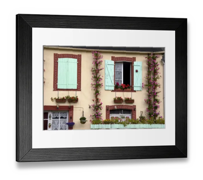 Framed Print : House with a nice display of geraniums in the department of Manche, France