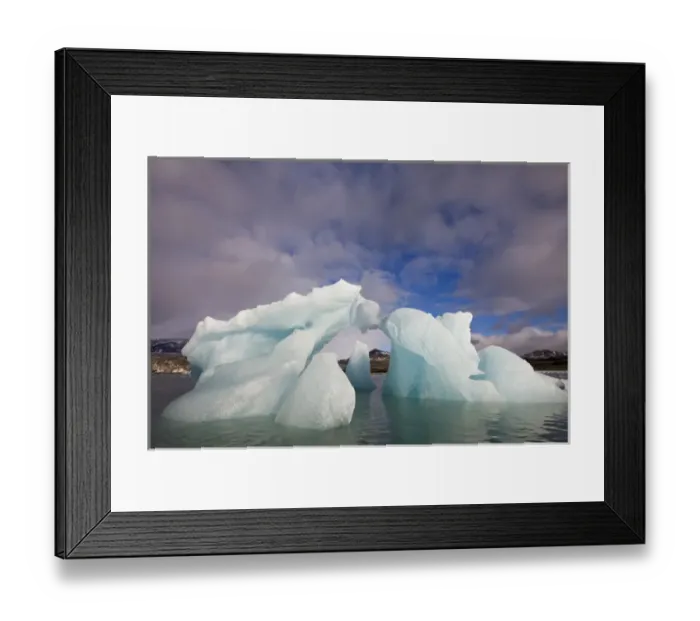 Framed Print : Norway, Svalbard, Spitsbergen Island, Morning sun lights arched iceberg floating Framed Print : Norway, Svalbard, Spitsbergen Island, Morning sun lights arched iceberg floating