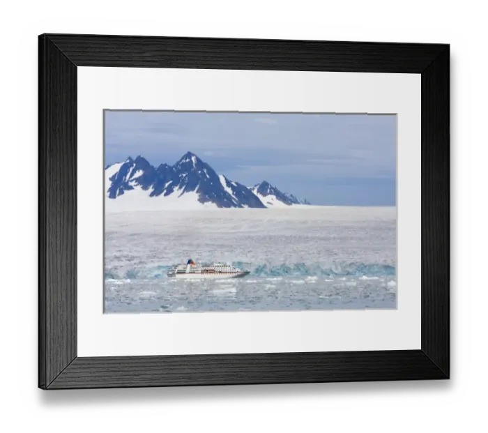 Framed Print : Norway, Svalbard, Spitsbergen, Cruise Ship MV Columbus motoring past blue ice face