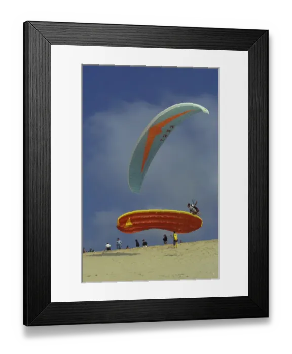 Framed Print : Europe, France, Aquitania, Dunes du Pilat. Paragliding on atlantic coast