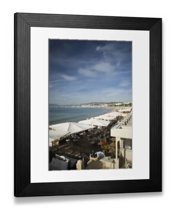 Framed Print : Restaurants on the beach walk area of Cannes, France Framed Print : Restaurants on the beach walk area of Cannes, France